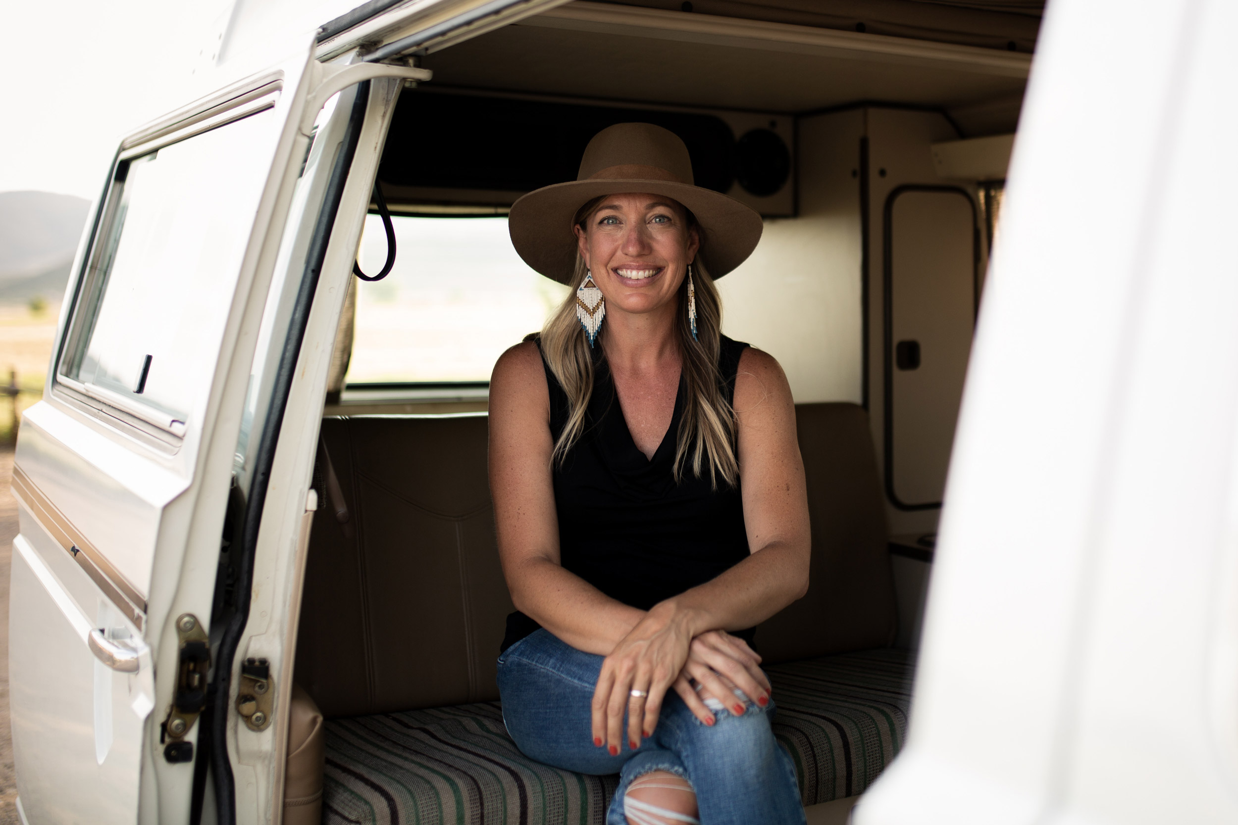 Portrait of a freelance writer in her Westfalia van - John Robson Photography