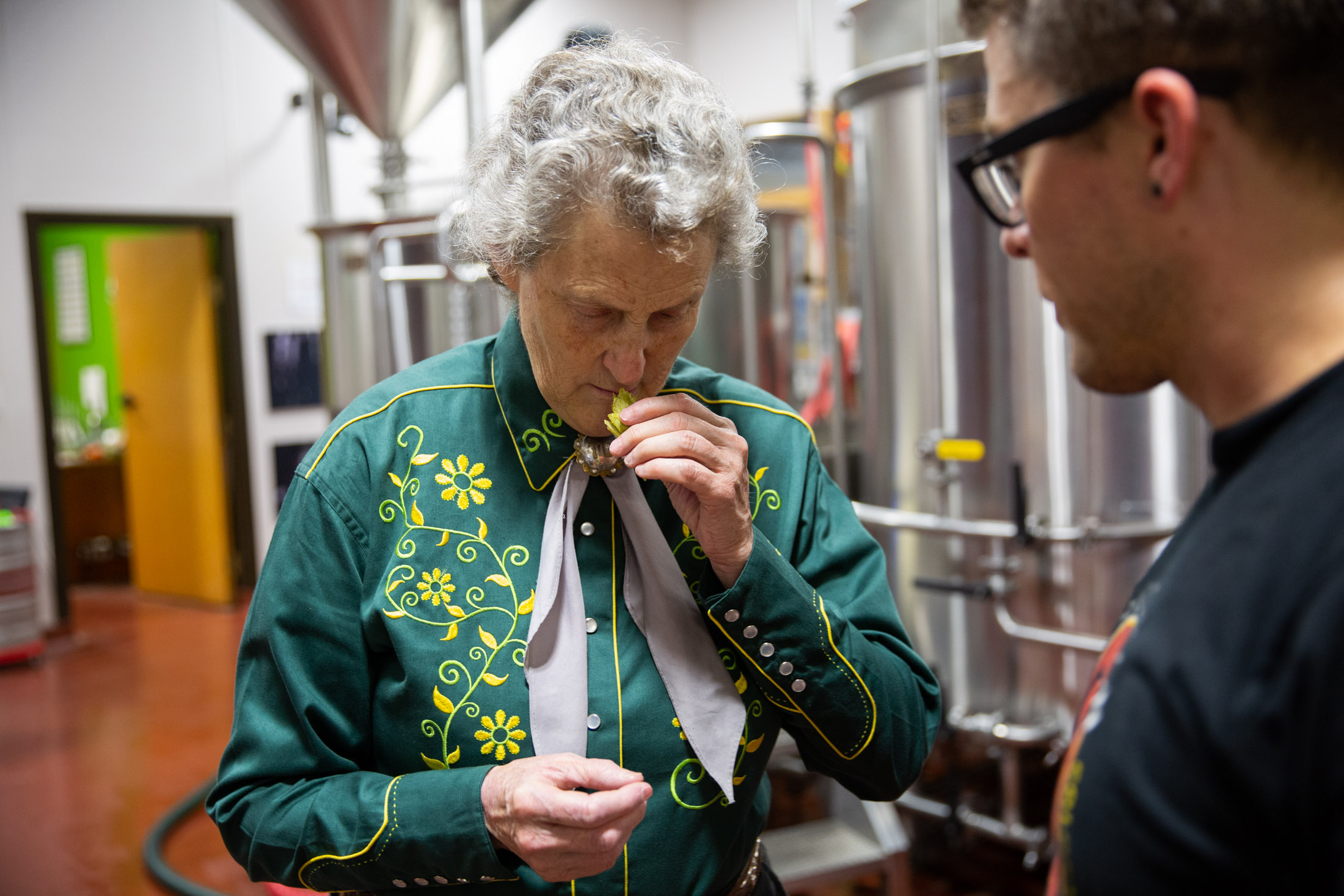 Temple Grandin smelling hops at Horse and Dragon Brewing - John Robson Editorial Photography